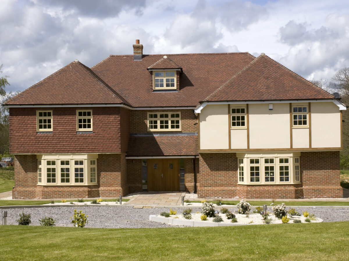 A,Big,Detached,Home,With,A,Cloudy,Sky